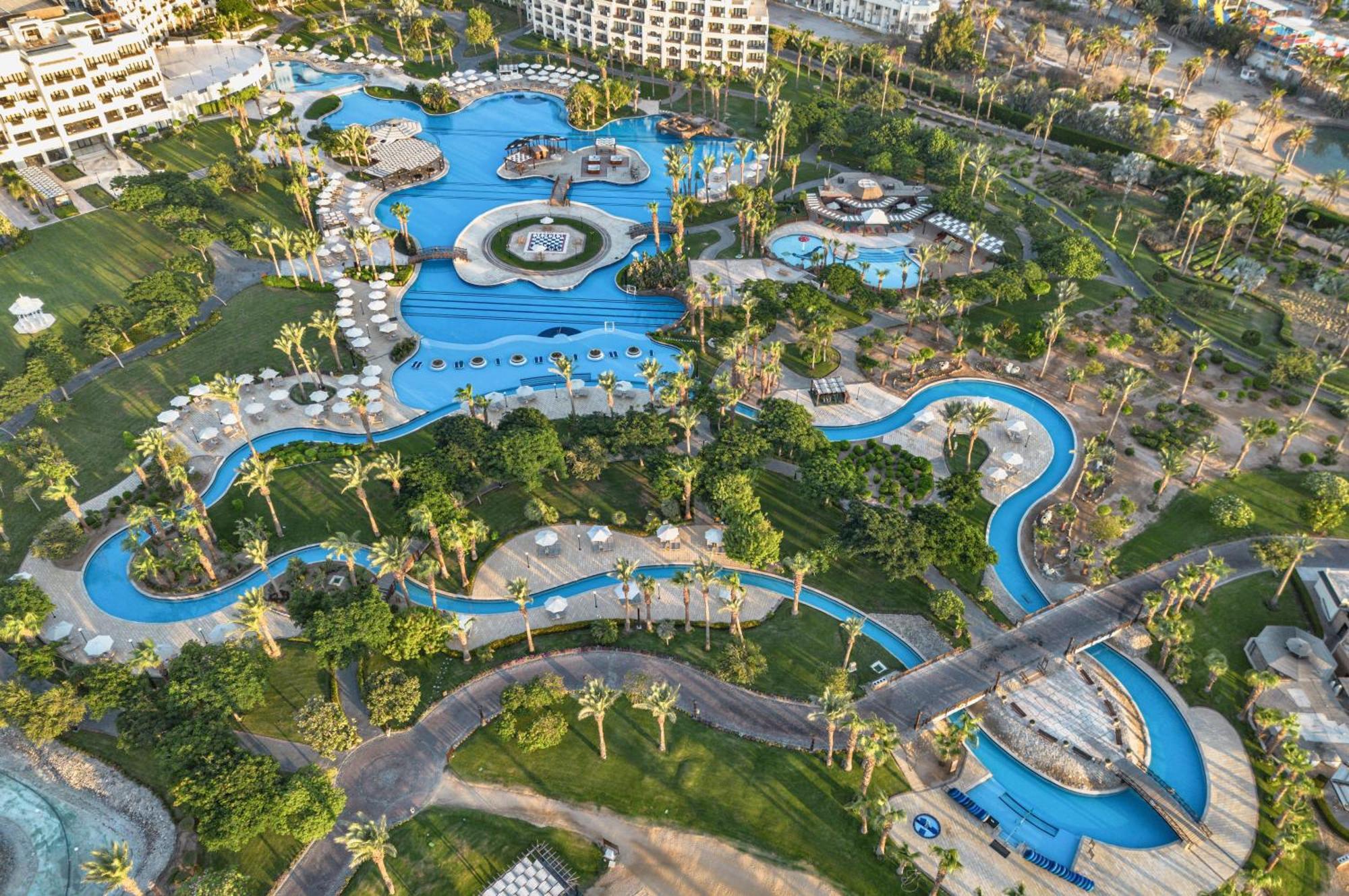 Steigenberger Aldau Beach Hotel Hurghada Esterno foto Aerial view of the pool complex